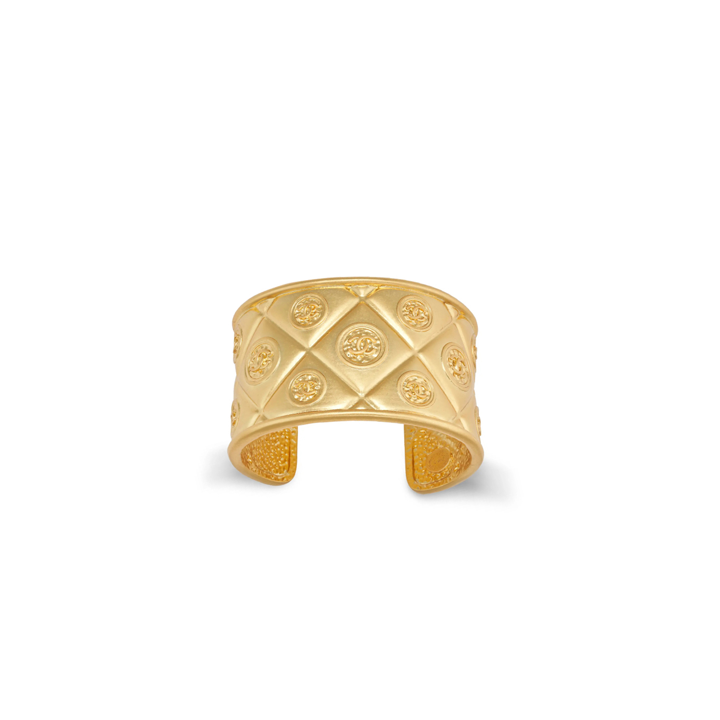 CHANEL A VINTAGE CUFF BANGLE IN 24CT GOLD PLATED 